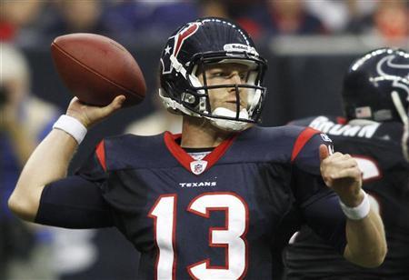 Houston Texans quarterback T. J. Yates passes the ball against the Atlanta Falcons during their NFL football game in Houston.
